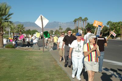 Protesters across the driveway